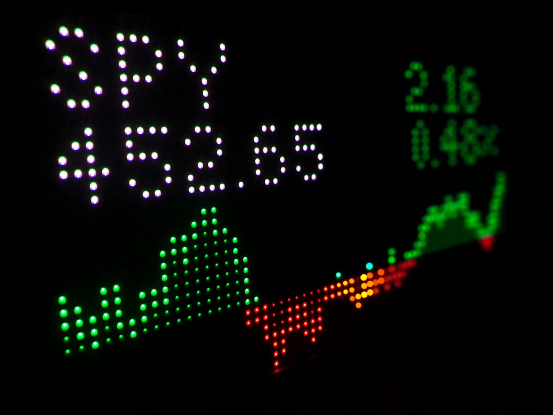 Photo by Tyler Prahm a close up of a clock with different colored numbers